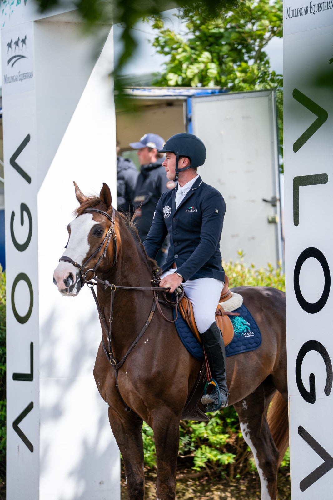 Equestrian event with a rider on a horse with Aloga Saddle Pad
